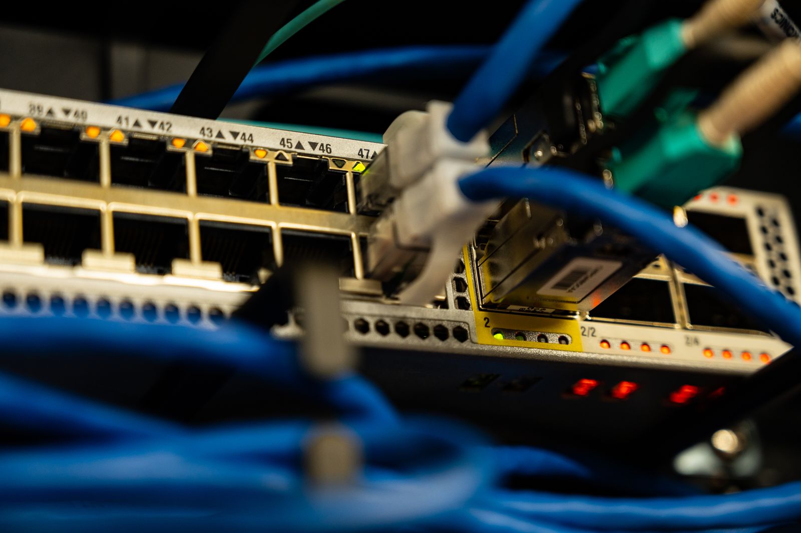 Network switch with Ethernet cables plugged in