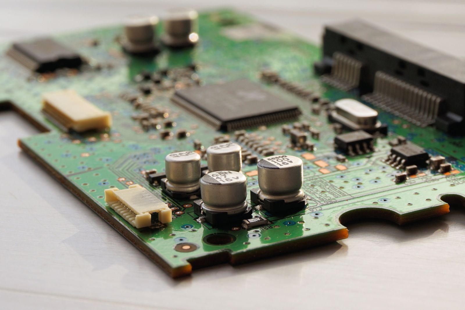 Green printed circuit board with capacitors and microchips